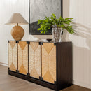Decorative sideboard with wicker doors, lamp, and plant in a room setting.