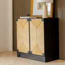 Cabinet with wicker doors and dark wood frame in a room setting.