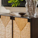 Cabinet with wicker doors and decorative items on a shelf