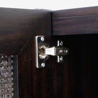 Close-up of a wooden cabinet with a hinge
