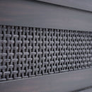 Close-up of a textured metal surface with a grid pattern