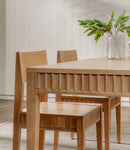 Wooden dining table with chairs decorated