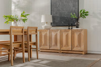 Natural Averi Modular Cabinet with chairs and a sideboard in a room with plants and a television.