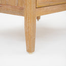 Close-up of a Natural Kalana 2 Drawer Rattan Nightstand leg 