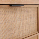 Close-up of a wooden drawer with woven texture