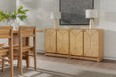 Wooden dining set with a sideboard in a room with a painting on the wall.