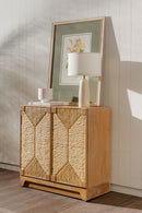 Wooden cabinet with decorative items against a neutral wall