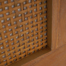 Close-up of woven wooden panel with a lattice pattern